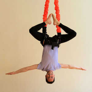 sling bungee fitness nyc man upside down at om factory